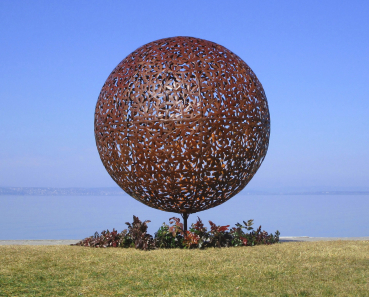 Big garden ball artwork rusty